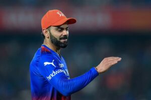 virat kohli with orange cap